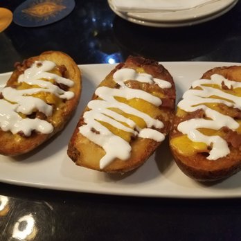 Morrison - Burbank - Giant Potato Skins with Cheese, Bacon Bits and Sour Cream. - Gastropubs Near Me - Burbank, California Morrison - Burbank - Giant Potato Skins with Cheese, Bacon Bits and Sour Cream. - Gastropubs Near Me - Burbank, California