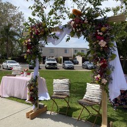 Floral arch made at home with Carlos flowers.
