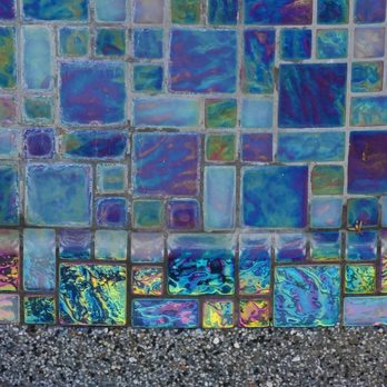 Precision Pool Tile Cleaning - Before puc. You can see the difference from above the water line, and the calcium buildup compared to below the water line. - Pool Cleaners Near Me - Eastvale, California