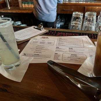 Growlers Pourhouse - Bar at Growlers. Drink of left Tom Collins and drink on right Spiked Michelada - American Near Me - Charlotte, North Carolina Growlers Pourhouse - Bar at Growlers. Drink of left Tom Collins and drink on right Spiked Michelada - American Near Me - Charlotte, North Carolina