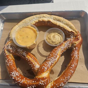The Bend - Sasquatch size pretzel with mustard and cheese sauce - Beer Bar Near Me - Bentonville, Arkansas