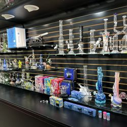 Good Time Super Smoke Shop - Expensive name brand/custom glass wall!
