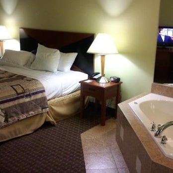 Sleep Inn & Suites - Jacuzzi room with jacuzzi in the same room as the bed.  It's big enough for 2 large or 3 normal sized people if you're kinky. - Hotels Near Me - Hiram, Georgia
