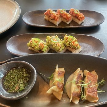 Azumi - Chicken gyozas, crispy rice (spicy tuna & truffle avocado) - Sushi Bars Near Me - Houston, Texas Azumi - Chicken gyozas, crispy rice (spicy tuna & truffle avocado) - Sushi Bars Near Me - Houston, Texas