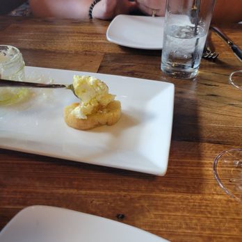 Woodfire - wow...wonderful appetisore! Crustini with local honey and whole milk riccotta. Bounissimo. - Pizza Near Me - West Dundee, Illinois