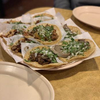 Taqueria Los Comales - a plate of tacos on a table - Mexican Near Me - Milwaukee, Wisconsin Taqueria Los Comales - a plate of tacos on a table - Mexican Near Me - Milwaukee, Wisconsin