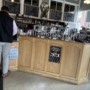 The Whole Bean Coffeehouse - a man standing at the counter - Coffee & Tea Near Me - Rocky Mount, Virginia