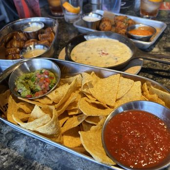 Topgolf - Queso guacamole and chips pretzel bites donut holes - New American Near Me - Albuquerque, New Mexico