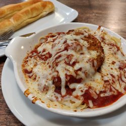 Fazoli's - Baked chicken parmesan. And their amazing fluffy bread sticks.