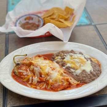 Pepper Pot - Relleno smothered in red, side of refried beans. It's chile season. Gotta eat chile. - Mexican Near Me - Hatch, New Mexico Pepper Pot - Relleno smothered in red, side of refried beans. It's chile season. Gotta eat chile. - Mexican Near Me - Hatch, New Mexico
