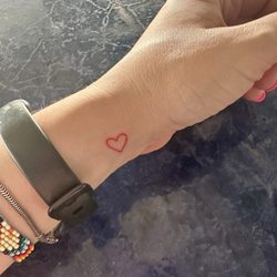 Marks of Distinction - Heart tattoo