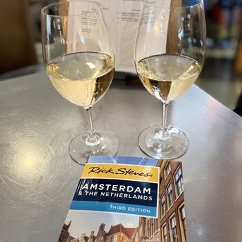 Vino Volo - two glasses of wine on a table - Wine Bars Near Me - Boston, Massachusetts Vino Volo - two glasses of wine on a table - Wine Bars Near Me - Boston, Massachusetts