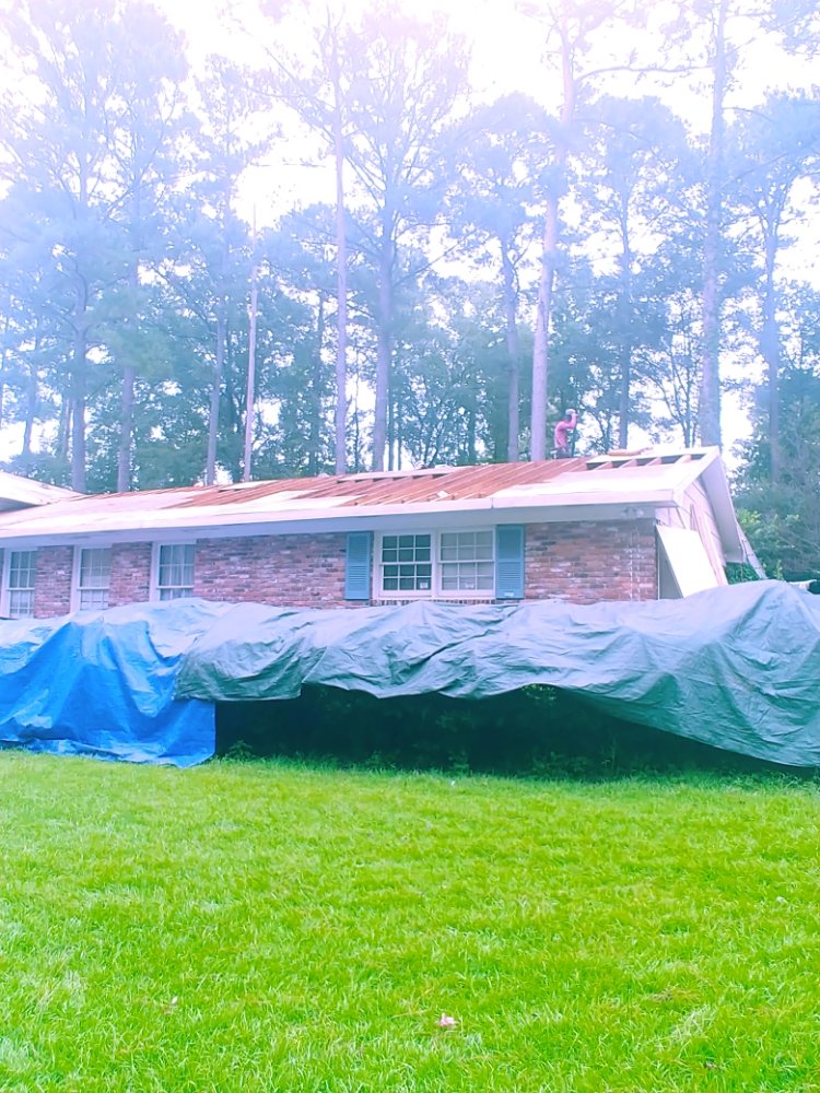 Slide of Farr Roofing