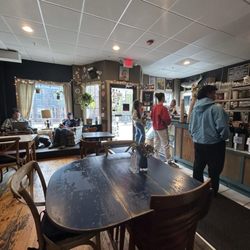 Crackskull's Coffee & Books - A short line of people waiting to order in the front of the store
