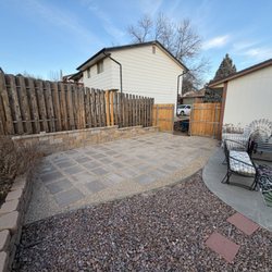 Pikes Peak Home and Yard - New retaining wall and pea stone paver patio area