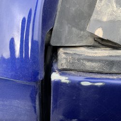 All American Truck & SUV Accessory Centers - Why has the paint been stripped from the corners of the tailgate of my 2022 Tacoma? Other side down to bare metal.