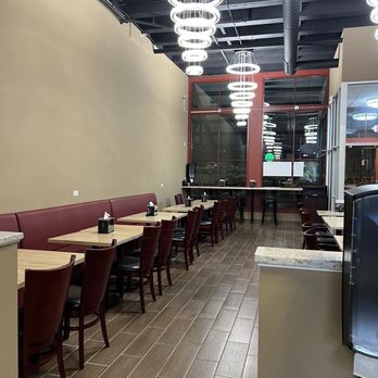 Fusion Poke - a dining area with tables and chairs - Ramen Near Me - Milwaukee, Wisconsin Fusion Poke - a dining area with tables and chairs - Ramen Near Me - Milwaukee, Wisconsin