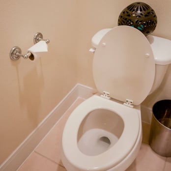 Naturalcare Cleaning Service - They got the hard stains out of my toilets!  And look at the little toilet paper triangles - so cute!! - Home Cleaning Near Me