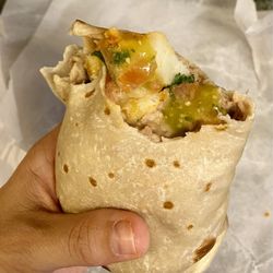 Santiago's Mexican Restaurant - Bean & cheese burrito, added potatoes. Green sauce on top