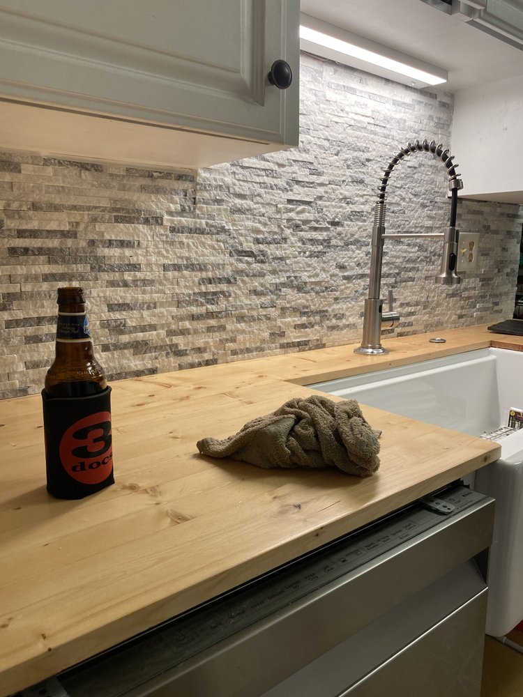 Slide of Elite Roofing & Renovations