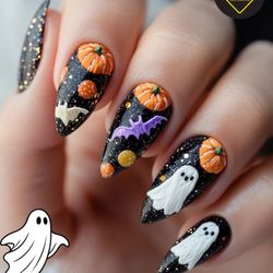 Ritzy Nail Lounge - Sweet pumpkins and sparkly polish? Yes, please! This mani is giving cozy Halloween cuteness all season long. Schedule today!