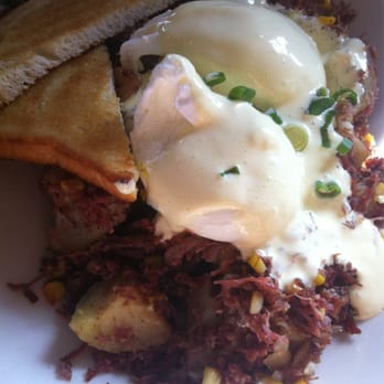 Lucky's Cafe - Corned beef hash special with two poached eggs drenched in hollandaise. - Coffee & Tea Near Me - Cleveland, Ohio