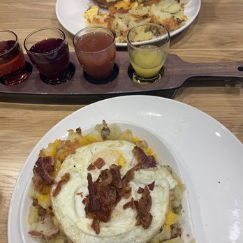 Broken Yolk Cafe - Waffle sandwich, Mamosa flight, corn beef hash over potatoes w/egg - American Near Me - Glendora, California
