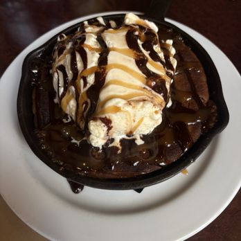 The Lodge - Cookie skillet with ice cream and Caramel/chocolate drizzle - American Near Me - Rancho Cordova, California The Lodge - Cookie skillet with ice cream and Caramel/chocolate drizzle - American Near Me - Rancho Cordova, California