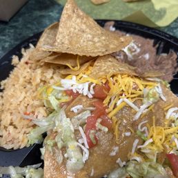 Beef hard shell tacos, rice and beans Beef hard shell tacos, rice and beans
