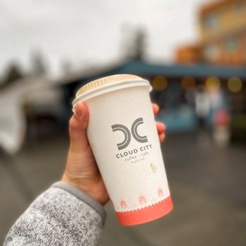 Cloud City Coffee - a hand holding a cup of coffee - Coffee & Tea Near Me - Seattle, Washington Cloud City Coffee - a hand holding a cup of coffee - Coffee & Tea Near Me - Seattle, Washington