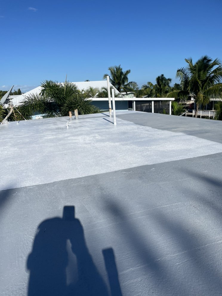 Slide of Andy The Roofer & Co