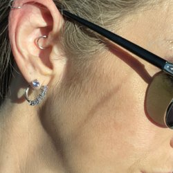 Inkfreak Custom Tattoos - Daith piercing