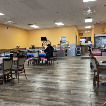 Amigos Mexican Restaurant - a person sitting at a table - Mexican Near Me - Frankfort, Illinois