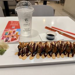 Tokyo Sashimi Roll Tokyo Sashimi Roll (Shrimp Tempura & Avocado Inside Wrapped By Crunchy Spicy Tuna Top W. Tuna & Salmon) Tokyo Sashimi Roll Tokyo Sashimi Roll (Shrimp Tempura & Avocado Inside Wrapped By Crunchy Spicy Tuna Top W. Tuna & Salmon)