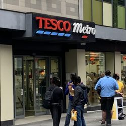 Tesco - Tesco Metro, at the foot of Temple Bar. Great spot for quick drink / snack.