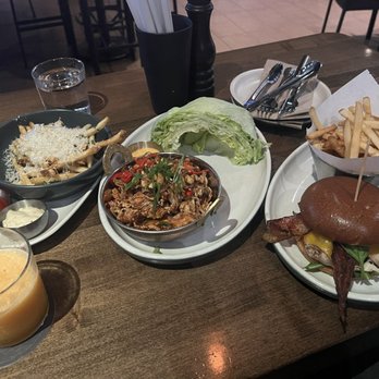 JOEY Bellevue - Truffle fries,  Chicken Or Shrimp Lettuce Wraps California Chicken Club Sandwich - New American Near Me - Bellevue, Washington