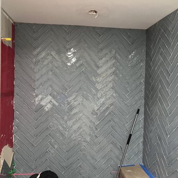Jaimes Handyman Remodeling - a man working on a wall - General Contractors Near Me