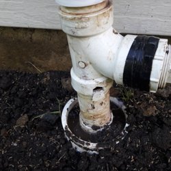 Lloyd Richard & Son & Miller - Cracked pipe coupling after ground settled. Not tamped after trench was originally dug. I placed good top soil to help grass grow