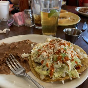 El Torero - Carnitas soft taco with a side of beans. - Mexican Near Me - Tucson, Arizona El Torero - Carnitas soft taco with a side of beans. - Mexican Near Me - Tucson, Arizona