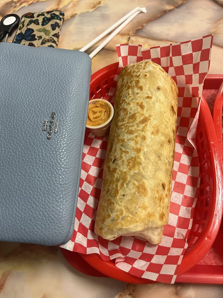 La Vaquita Mexican Grill Logo