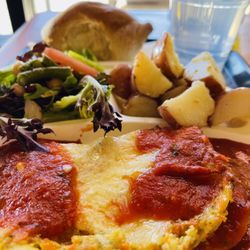 Il Pastaio - Veggie lasagna topped with spicy arrabbiata sauce, roasted potatoes, Salad and bread