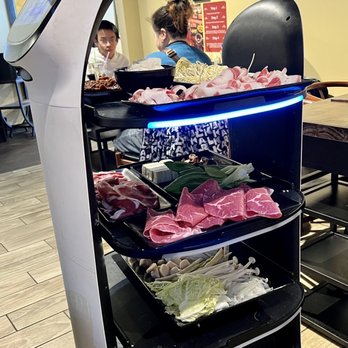 A Tasty Hot Pot - Robo-cat delivering food - Hot Pot Near Me - Aurora, Illinois A Tasty Hot Pot - Robo-cat delivering food - Hot Pot Near Me - Aurora, Illinois