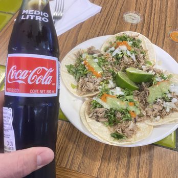 Adela's Authentic Mexican Restaurant - 4 Carnitas tacos with a Mexica Coca Cola! - Mexican Near Me - Tacoma, Washington Adela's Authentic Mexican Restaurant - 4 Carnitas tacos with a Mexica Coca Cola! - Mexican Near Me - Tacoma, Washington