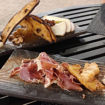 Bolero Restaurante - 50% jamon iberico and 3 cheeses (manchego, goat cheese, creamy cow cheese). Comes with nuts, fig, champagne grapes, and honeycomb. - Tapas/Small Plates Near Me - Temecula, California Bolero Restaurante - 50% jamon iberico and 3 cheeses (manchego, goat cheese, creamy cow cheese). Comes with nuts, fig, champagne grapes, and honeycomb. - Tapas/Small Plates Near Me - Temecula, California