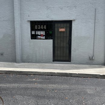 Chunkay - a bike parked in front of a building - Personal Chefs Near Me