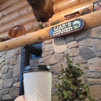 Happy Angler's - a hand holding a cup of coffee - Coffee & Tea Near Me - Island Park, Idaho Happy Angler's - a hand holding a cup of coffee - Coffee & Tea Near Me - Island Park, Idaho