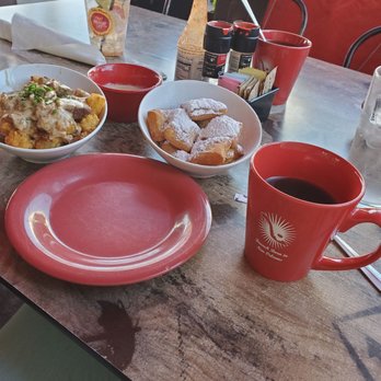 Ruby Slipper Pensacola - Loaded Tots and beignets with whiskey cream sauce. - Breakfast & Brunch Near Me - Pensacola, Florida Ruby Slipper Pensacola - Loaded Tots and beignets with whiskey cream sauce. - Breakfast & Brunch Near Me - Pensacola, Florida