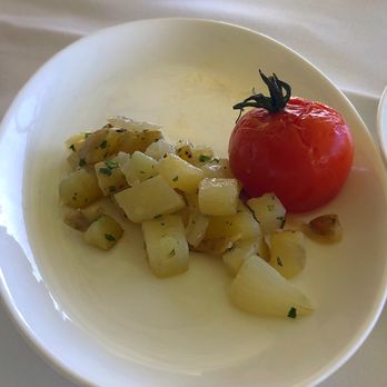 Orchids - Side of potatoes and tomato. Comes with the Spicy Scrambled Eggs - Breakfast & Brunch Near Me - Honolulu, Hawaii Orchids - Side of potatoes and tomato. Comes with the Spicy Scrambled Eggs - Breakfast & Brunch Near Me - Honolulu, Hawaii