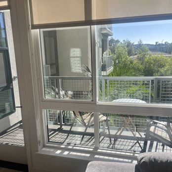 Precision Facility Solutions - The before photo - dull & foggy - Window Washing Near Me