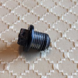 Freedom Tire and Auto Service Center - This is the oil pan plug that fell out a few weeks after Freedom Tire changed the oil.
